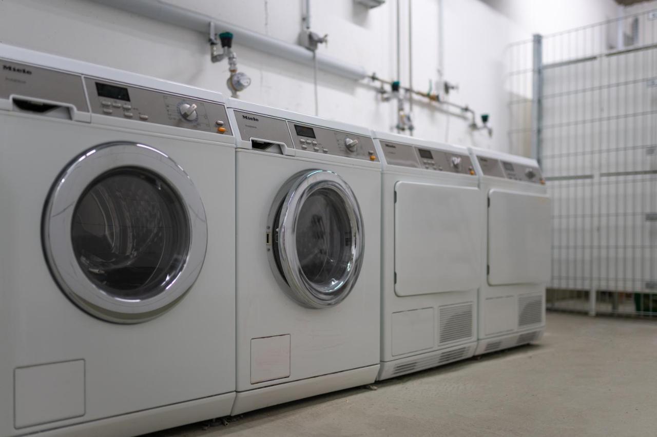 Hostel MHG Exterior photo Commercial laundry
