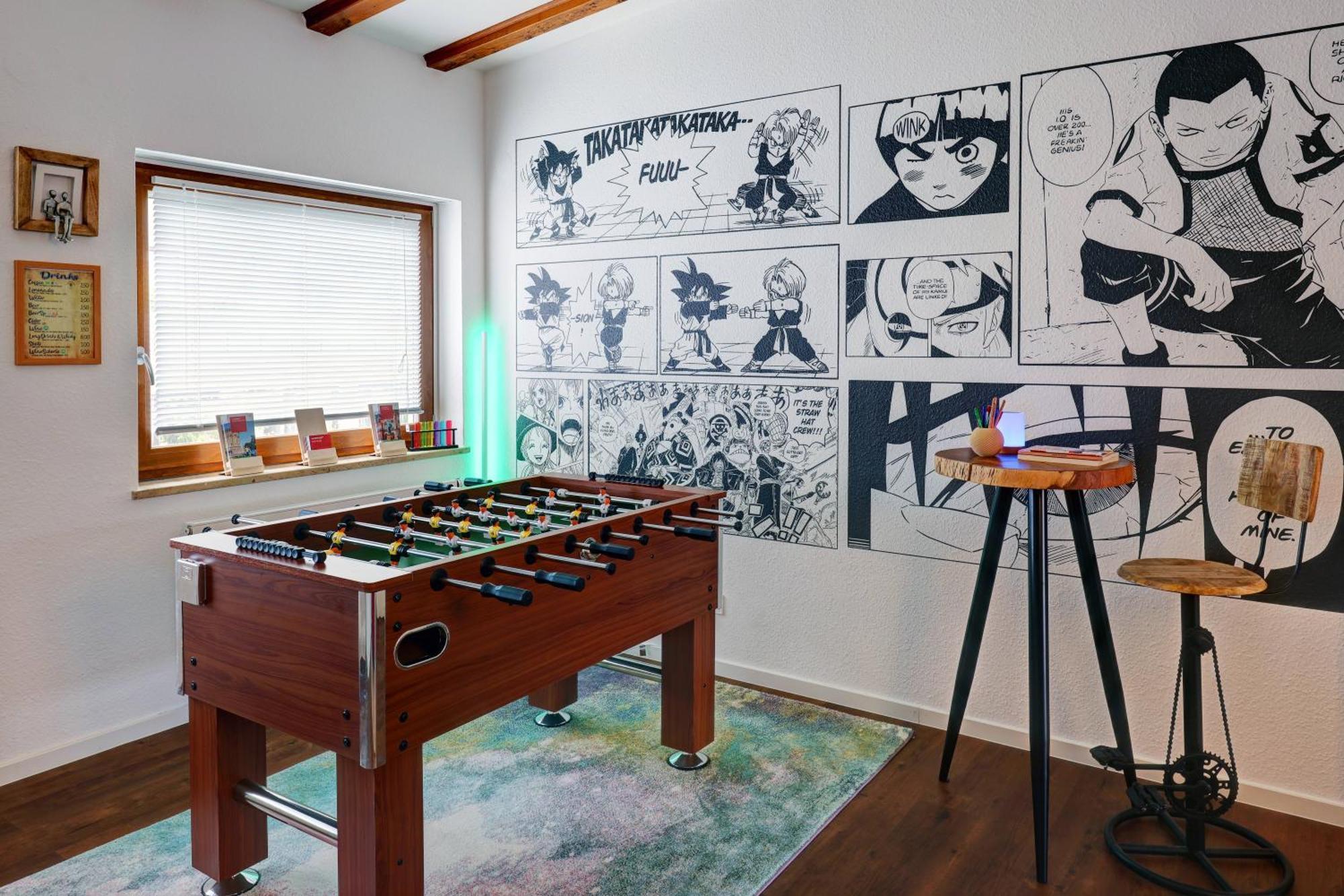 Hostel MHG Exterior photo A foosball table