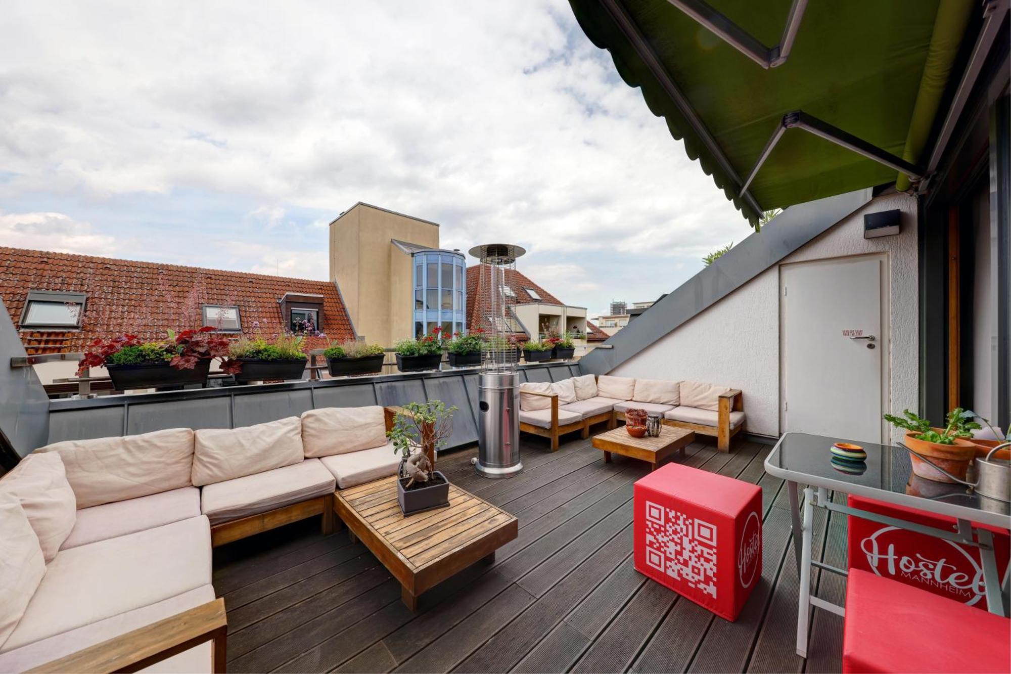 Hostel MHG Exterior photo Rooftop terrace